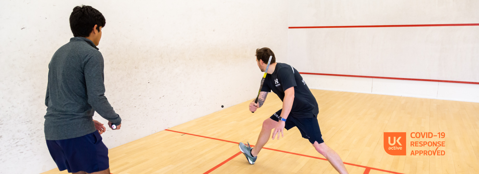 boys playing squash